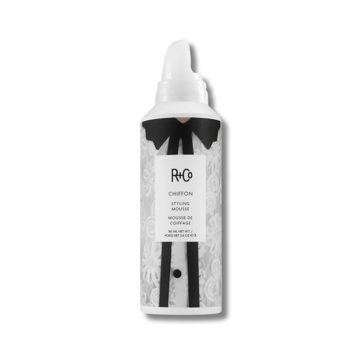 Hair mousse bottle with black and white design on a white background
