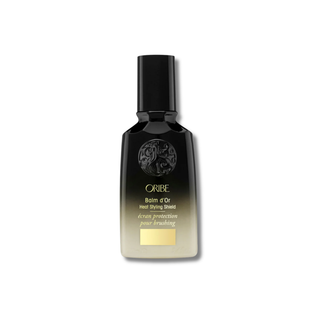 Oribe hair product bottle on a white background