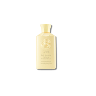 Oribe hair product bottle on a white background