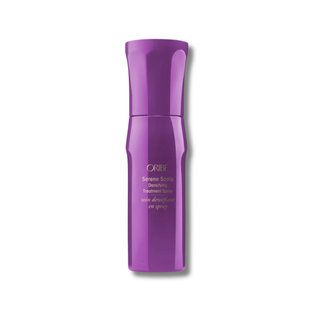 Purple Oribe hair product bottle on a white background