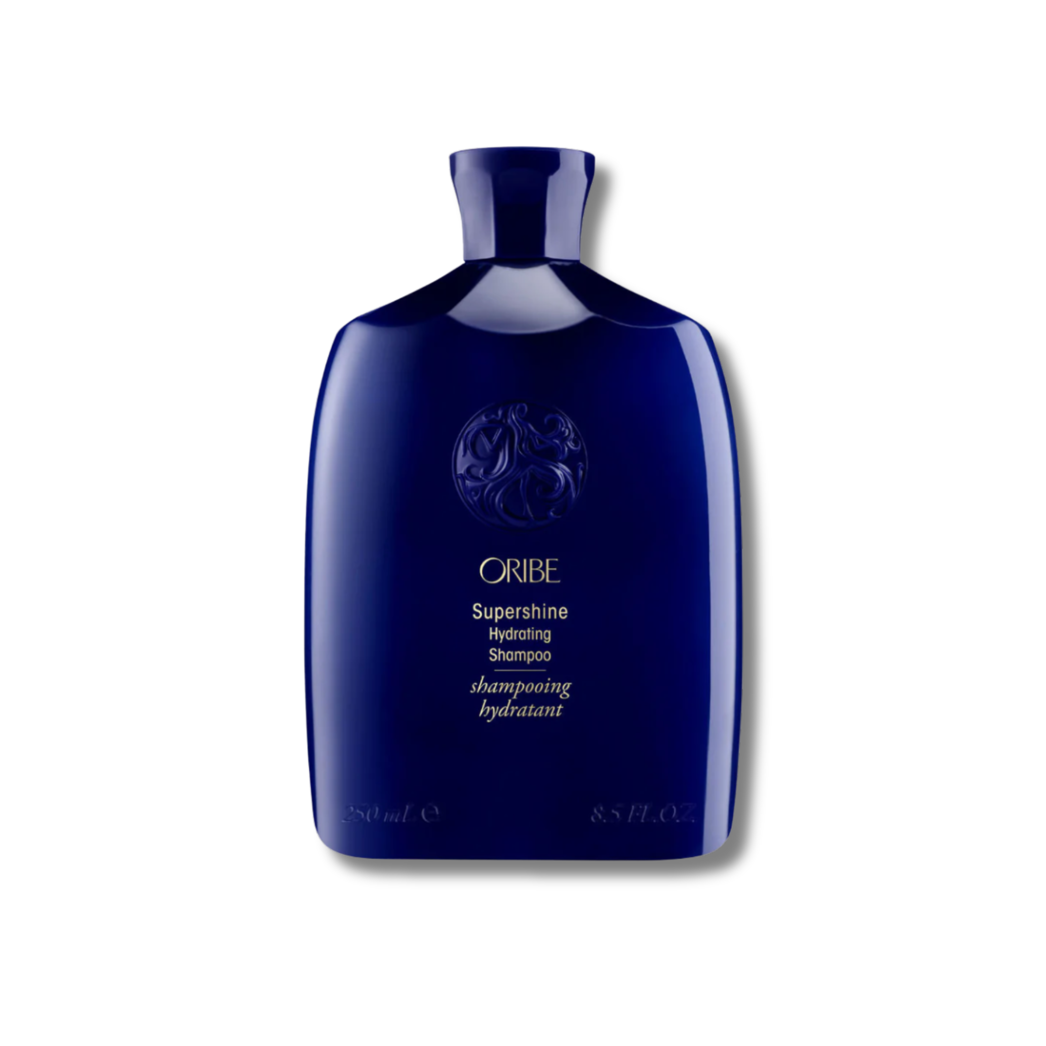 Blue shampoo bottle with Oribe logo on a white background