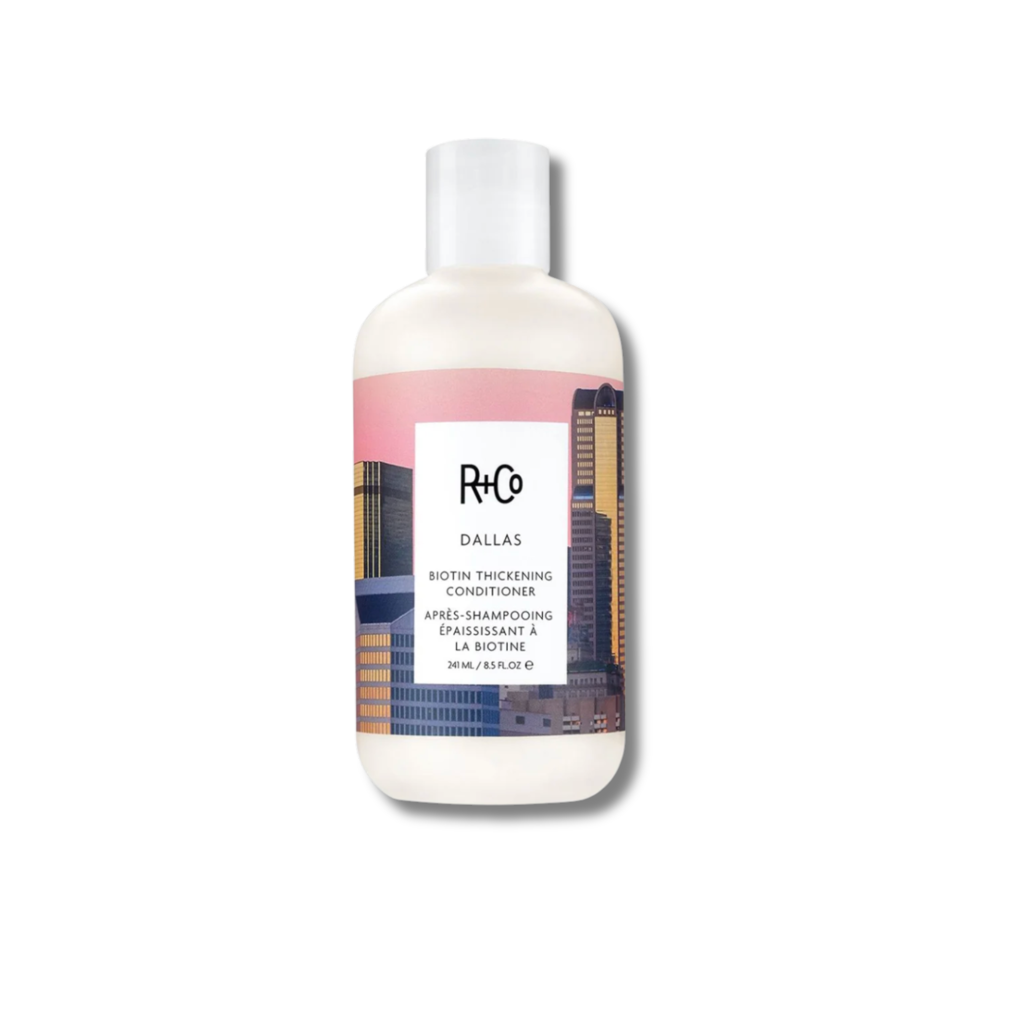 Bottle of R+Co Dallas Biotin Thickening Conditioner on a white background