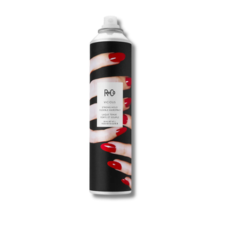 Hair spray can with red nail polish design on a white background
