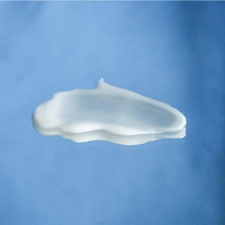 White cloud-shaped object on a blue background
